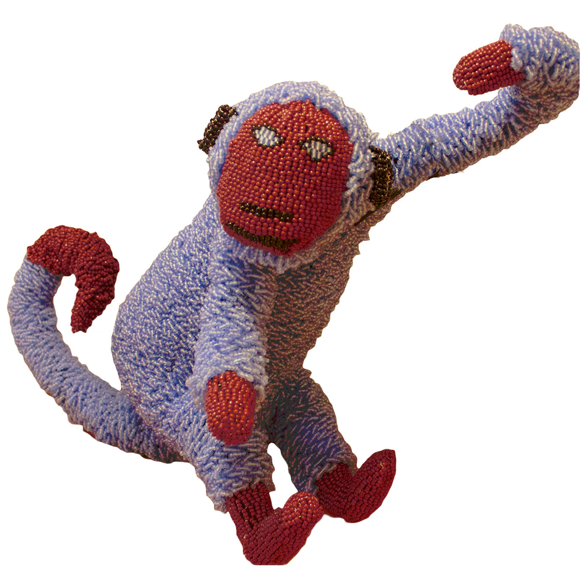 Beaded blue monkey handcrafted by female artisans in Africa. These joyful sculptures add whimsy and colour to any room. 