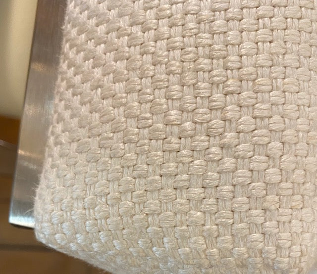 Pair of Alex Chairs upholstered in a white woven linen feature a contemporary design and make excellent accent chairs.