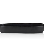 Black Resin troughs by Tina Frey Designs'  is hand-sculpted of black shatter-resistant BPA-free resin and features organic-shaped edges. The food-safe vessel can hold fruit, display decorative objects, or simply serve as a statement piece in the space of your choosing.