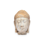 A carved Buddha head sculpture made of marbled stone with beige, gray, and white veining, set against a solid white background.