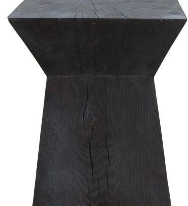 This African stool adds a sculptural accent to any living space.