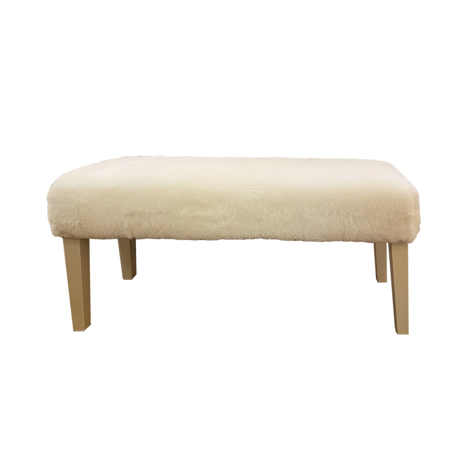 White shearling sheepskin bench with cream lacquer base adds a sophisticated edge to any space.