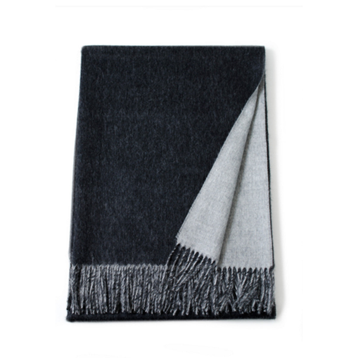 Reversible baby alpaca throws are versatile additions to either your decor or wardrobe.