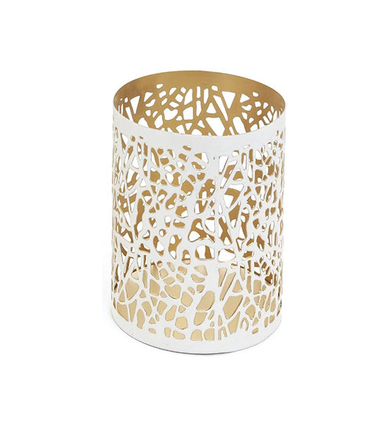 White and gold decorative vase with organic details. 